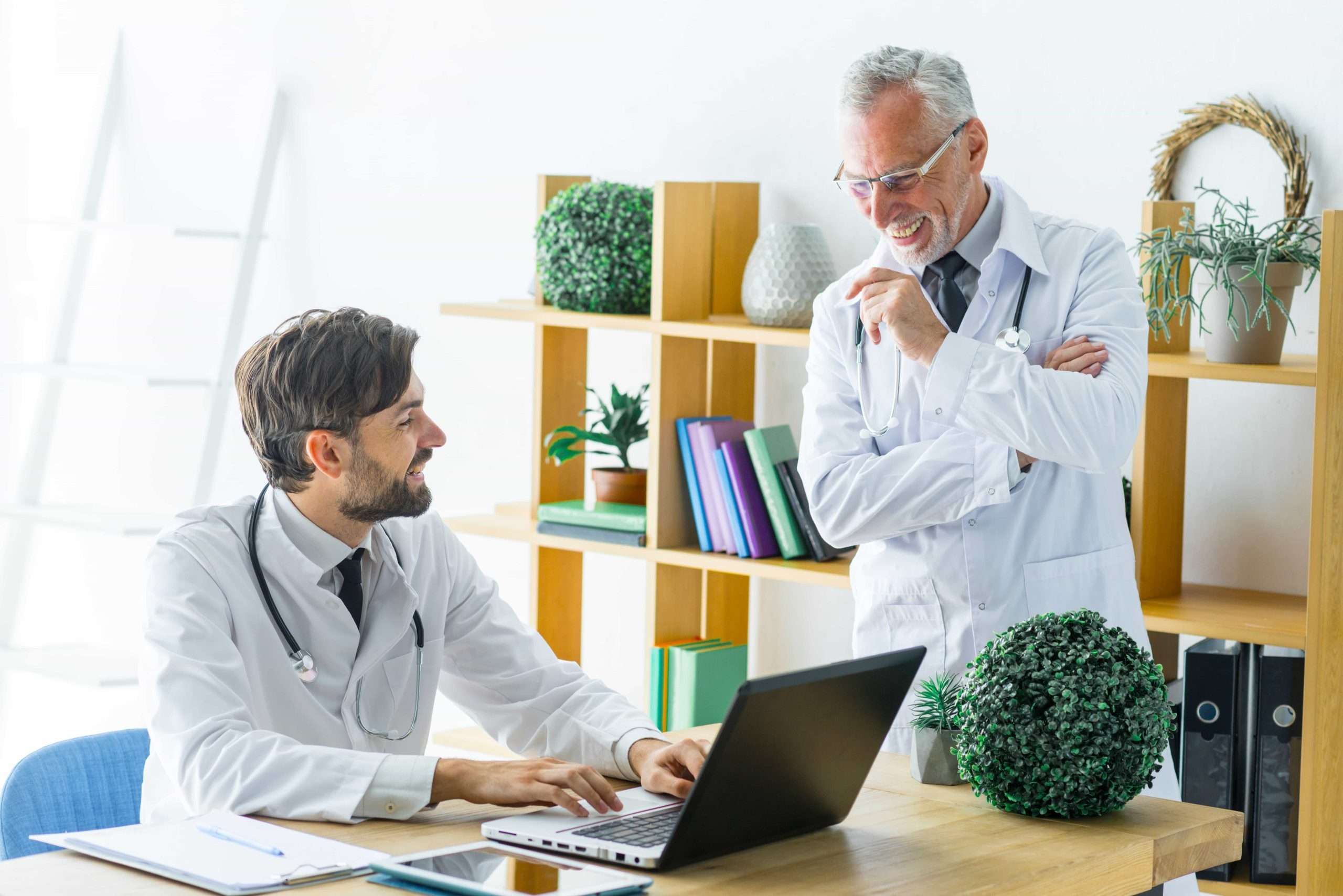 Meditism family doctors collaborating on patient care